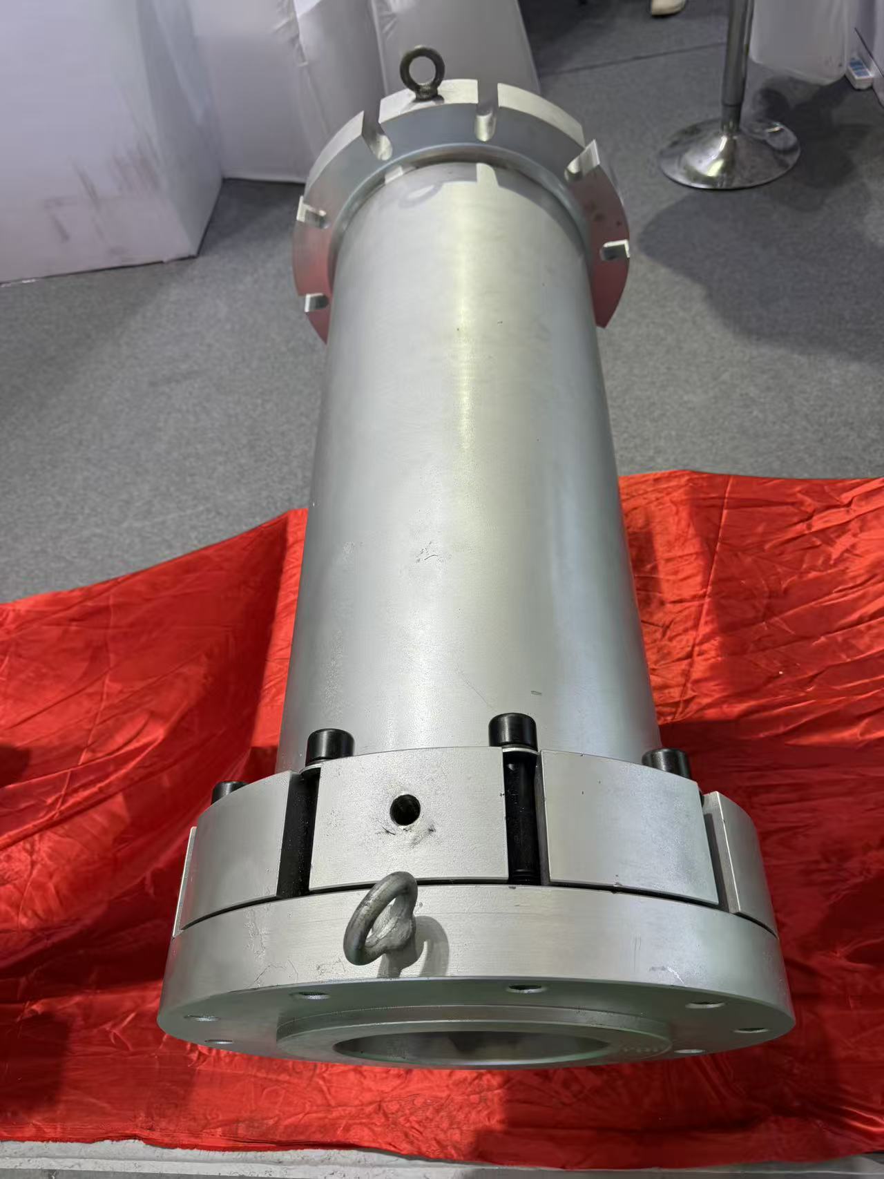 WB Microwave Machine planetary screw cylinder assembly showing precision flanged inlet section, segmented clamping collar, lifting rings, and machined end face for high-throughput PVC extrusion applications